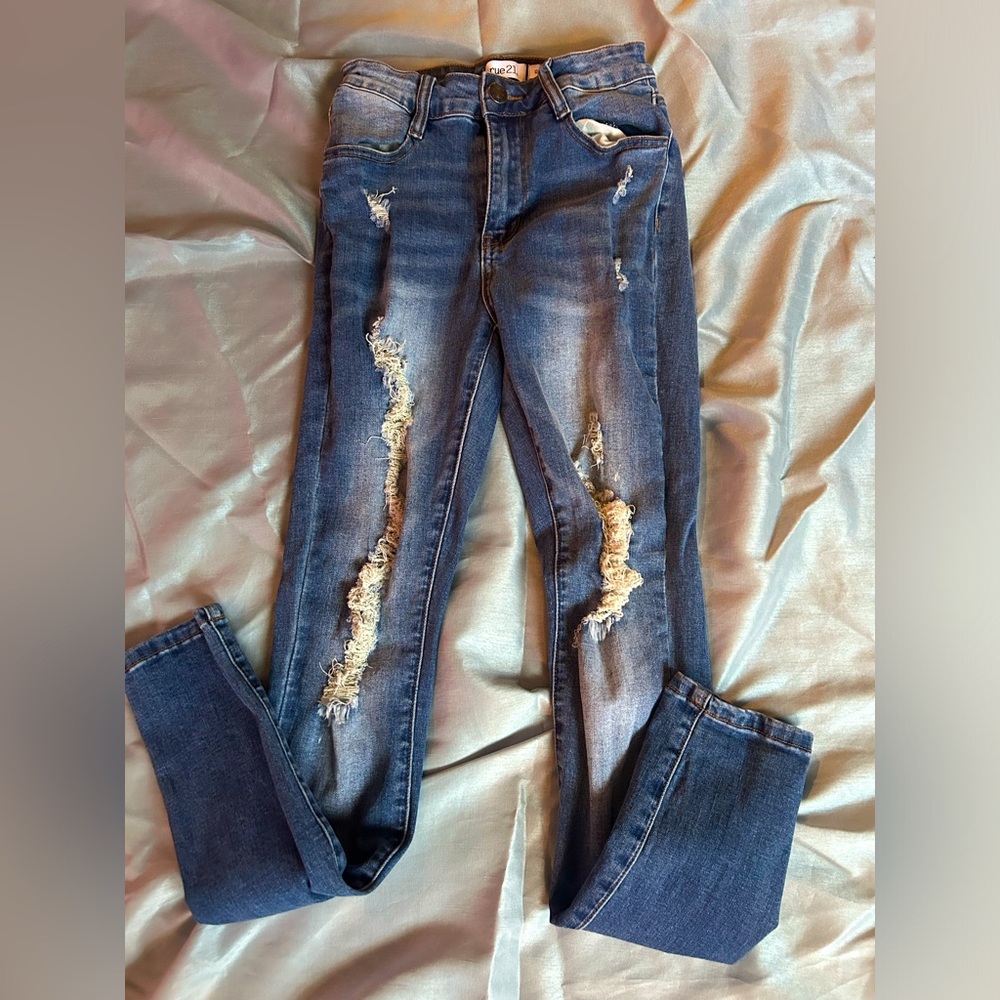Rue 21 darkwash pants. They’re in good condition.